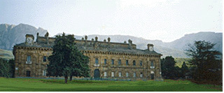 The hunting lodge and (beyond) the Rock of Bussambra.